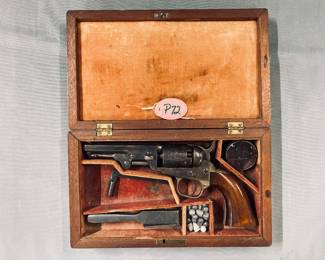Colt 1849 Pocket “1860” with bullet mold, cap tin, and lead balls
