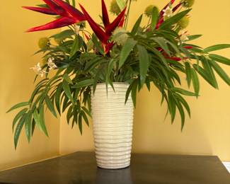 Ribbed cream ceramic vase with tropical faux floral arrangement