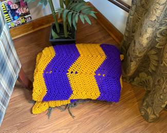 Handmade crochet throw blanket in purple and gold stripes