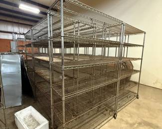 Chrome wire commercial shelving units on casters, six tiers