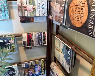 Wooden magazine rack with rungs, holds multiple magazines
