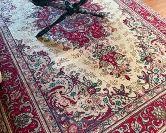 Persian style floral area rug in red and cream