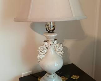 White ceramic table lamp with applied rose accents and gilt trim