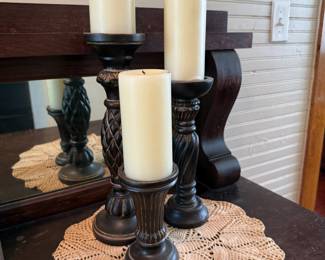 Carved wood pillar candlesticks with pillar candles, set of three