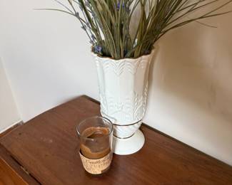 White embossed ceramic vase with faux lavender stems and candle