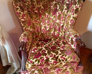 Vintage channel-back armchair with floral velvet upholstery and claw feet