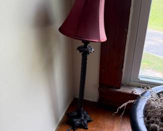 Twisted metal candlestick lamp with burgundy bell shade