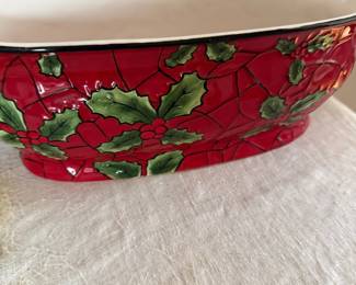 Oval ceramic bowl with stained-glass style holly and poinsettia design