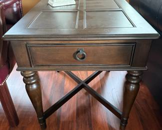 Dark wood end table with drawer and turned legs
