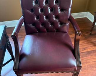 Burgundy tufted leather office armchair with nailhead trim