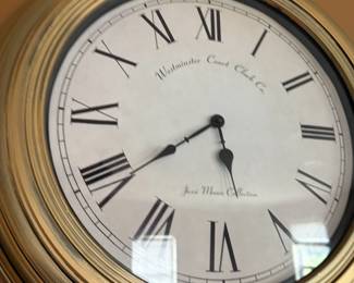 Westminster Court Clock Co Roman numeral wall clock in brass frame