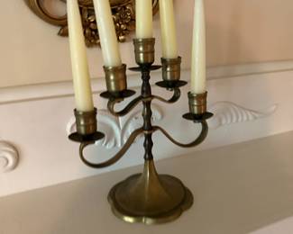 Brass five-arm candelabra with taper candles