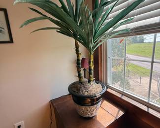 Artificial yucca palm in decorative ceramic planter