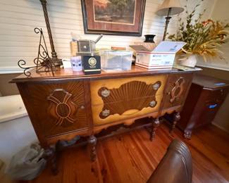 Antique sideboard with sunburst inlay and turned legs