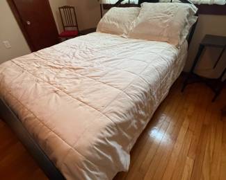 Dark metal arched headboard bed with mattress, full size