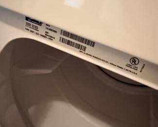 Kenmore electric clothes dryer with model tag visible