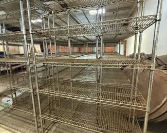 Chrome wire shelving units on casters, multiple tiers