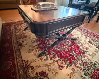 Wood coffee table with pedestal base and reeded splayed legs