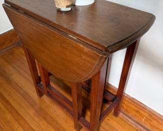 Small drop-leaf side table with tapered legs