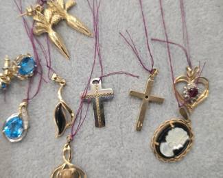 Gold pendants and charms