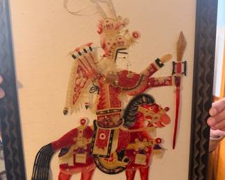 “Vintage Framed Chinese Shadow Puppet (Pi Ying). Authentic hand-carved and custom-dyed translucent leather (hide). Depicts a legendary armored military warrior on a warhorse. A beautiful piece of theatrical folk art history.”