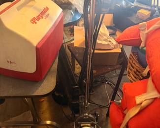 vintage 12-inch commercial floor buffer and polisher featuring a heavy-duty chrome motor housing and its classic original "12" emblem on the handle fork