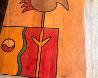 authentic, hand-painted wooden piece by Israeli design studio Kakadu Art & Design, featuring their signature stylized bird motif. The lower right corner clearly displays the hand-painted "KAKADU®" studio signature alongside a registered trademark symbol.