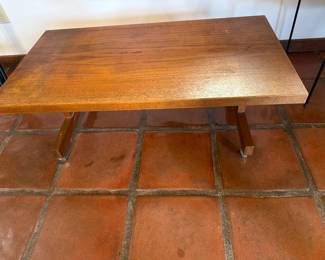 Danish MCM teak rolling coffee table