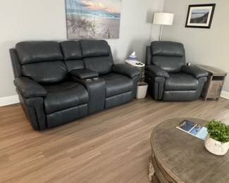 Rooms to Go real leather Love seat $500.00. Recliner $300.00