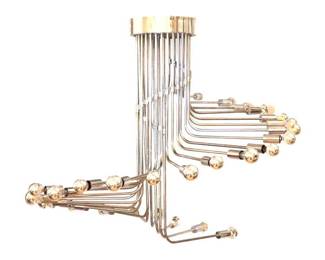 Lot 987 30 Light Reggiani Chandelier, Italy, 1970s. polished nickel chandelier