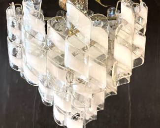 Lot 988 Mid Century Modern Murano style Glass Ribbon Chandelier. Clear Glass Curly Qs with Opaque White Stri