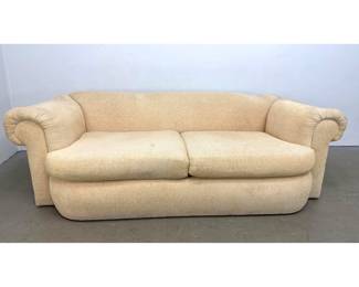 Lot 1211 Postmodern 2 cushion upholstered sofa with rolled arms and ribbed corduroy fabric.