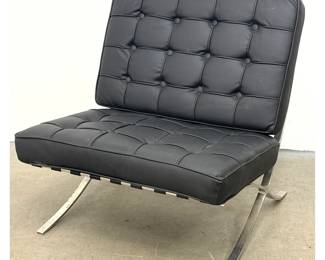 Lot 1066 Barcelona style Lounge Chair. Modernist Design. Black Vinyl Tufted Seat Cushion. Iconic style chrome
