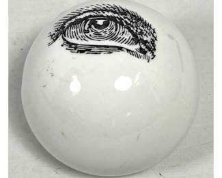 Lot 787 Fornasetti style Spherical White Ceramic Paperweight with Transfer Printed Eye Graphic and Felt Base
