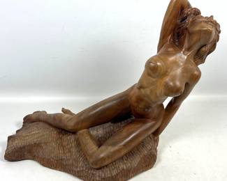 Lot 812 Artist Signed Carved wood nude sculpture.