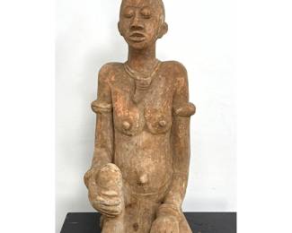 Lot 934 West African Djenne Style Terracotta Seated Female Figure. She wears hip wrap and jewelry. Pedestal