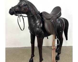 Lot 1144 Large Scale Leather Wrapped Equestrian Display Horse Sculpture with English Saddle and Bridle. Unsig