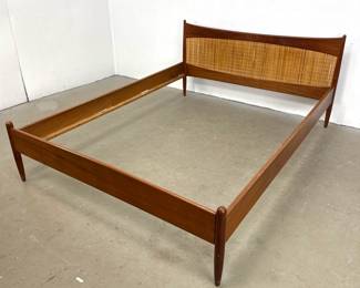 Lot 1150 Danish Modern Teak and Rattan Bed Frame with Ox Yoke Headboard.