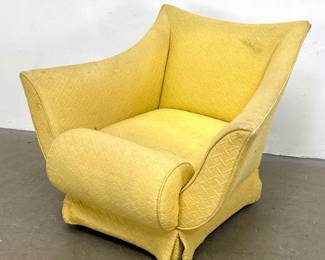 Lot 1210 Mid Century Modern Stylized Wingback Lounge Chair. Unique Form upholstered in yellow fabric.