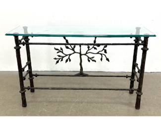 Lot 917 Ilana Goor style Iron Base Console Table. Tree of Life Motif. Glass Top. Textured black Iron Frame w