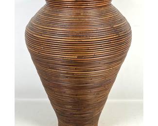 Lot 1031 Large Pencil Reed Floor Vase. Horizontal Coiled Rattan Construction and Flared Rim.