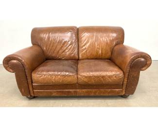 Lot 1215 Contemporary Club Style 2 Seat Loveseat in Distressed Cognac Leather with Rolled Arms and Bun Feet