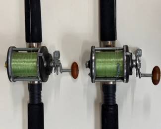Pair of Penn Slammer boat rod and reel combos