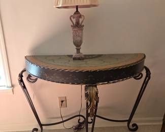 Pair of decorative metal basses demi lunes