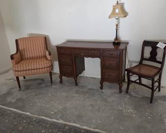 Vintage boudoir desk, upholstered armchair and American Classical Period side chair.