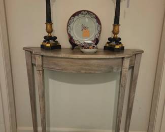 Vintage console with a pair of French Empire candleabrasa 