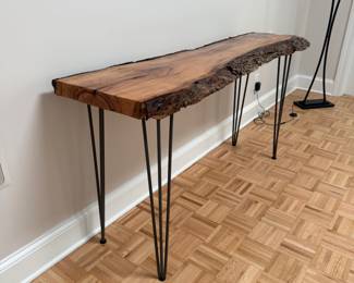 F12 - $150. Double Live Edge Sofa / Console Table. Measures 61" at the longest spot x 18" deepest x 32.5" tall. 