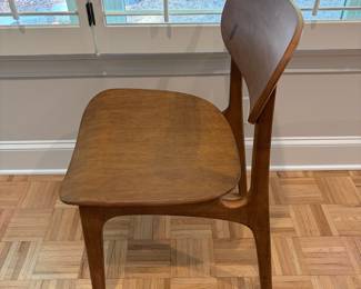 F61 - $300. Black Dining Room Table with 6 Wooden Chairs. All are newer and made to look like MCM furniture! Table measures 71" x 35.5" x 29.5" tall. Chairs are 19.5" wide x 21" deep x 33.25" tall. Seat to floor is 18".  Excellent condition and very gently used!