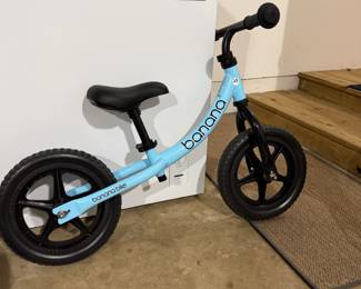 F85 - $25. Banana Bike - Lightweight Childs balance bike. 