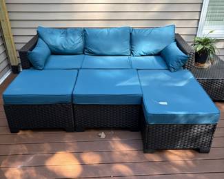 F62 - $175. 7 Piece Plastic Rattan Couch, Chairs, ottomans & side table. No issues noted. Stored on a covered back porch.  